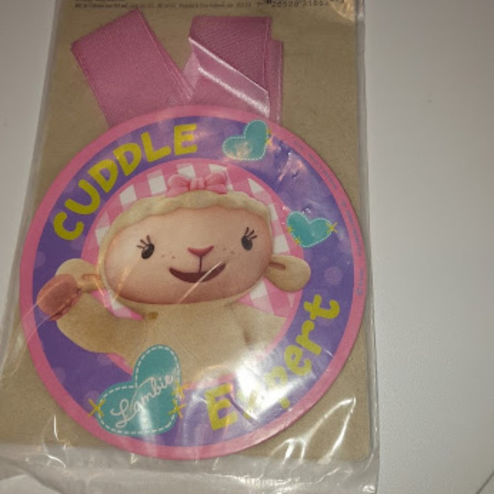 $3.00/FREE: NIP DocMcStuffins Cuddle Badge